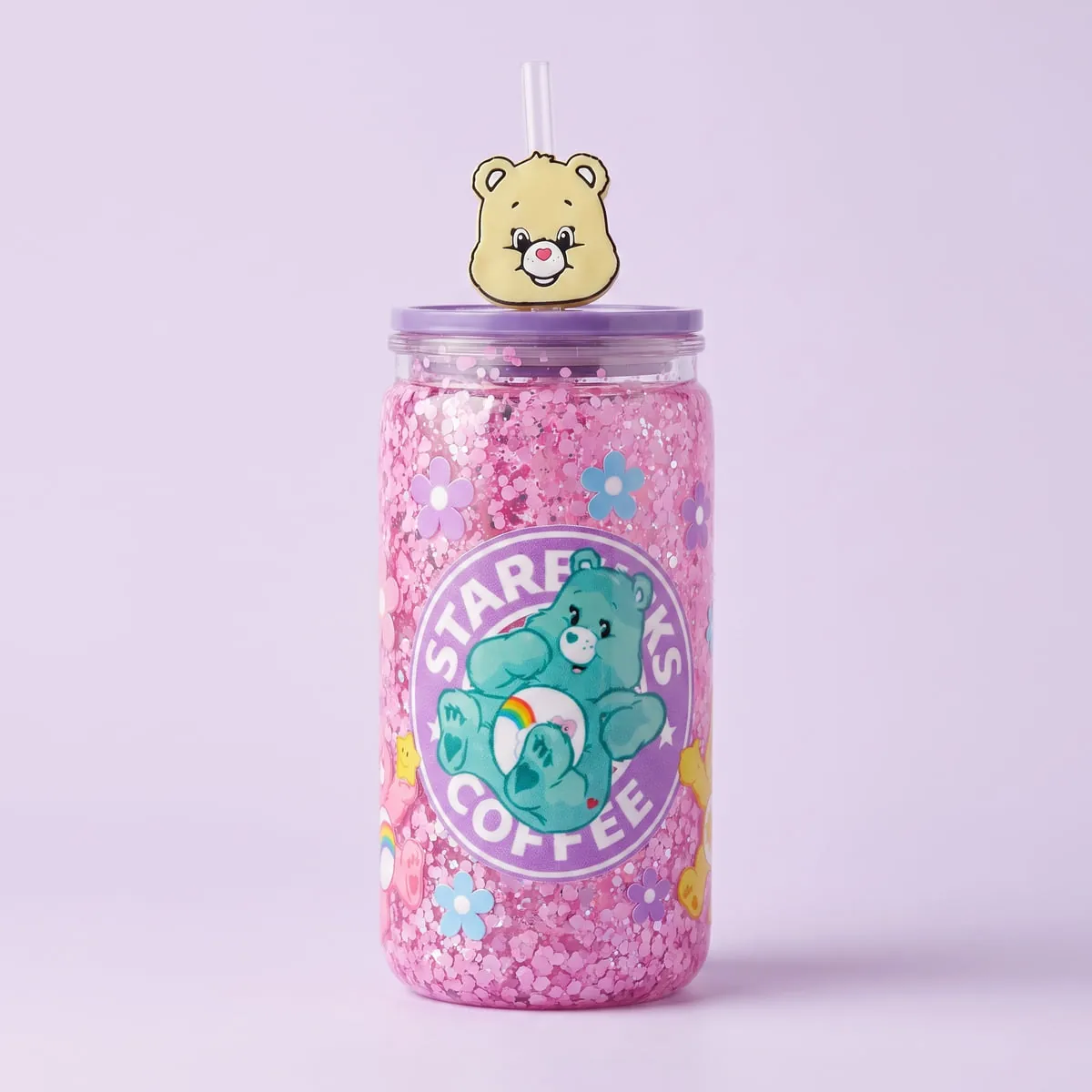 Pink Glitter Bear Snow Globe Cup standing upright — a can-shaped tumbler with a pink glitter-filled wall, pastel flower and bear decals, a lavender lid and a yellow bear straw topper