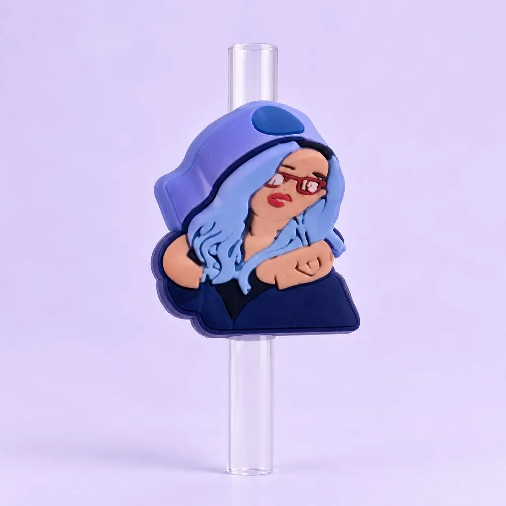 Blue Hair Girl Topper on a clear straw, pale lavender backdrop — shaped like a cartoon girl with long blue hair and glasses