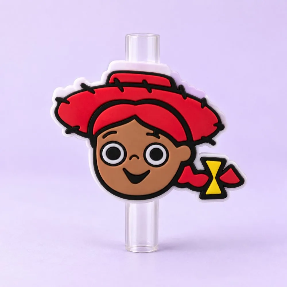 Cowgirl Doll Topper on a clear straw, pale lavender backdrop — shaped like a cartoon cowgirl doll face with red hat and freckles