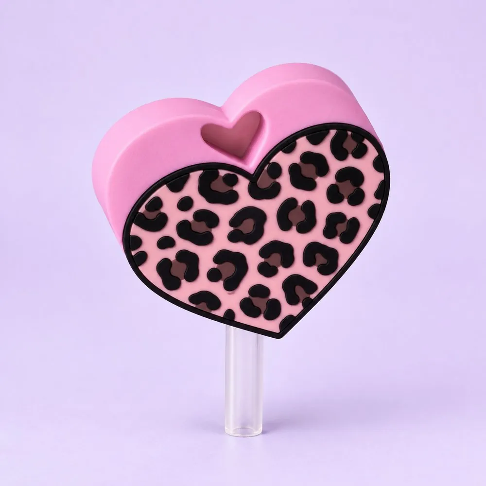 Leopard Heart Topper on a clear straw, pale lavender backdrop — shaped like a pink heart with leopard print