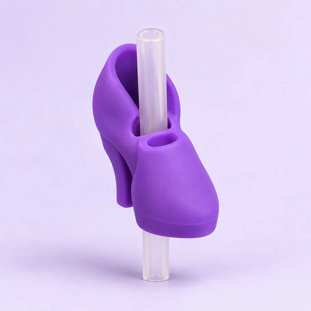 Purple Heel Topper on a clear straw, pale lavender backdrop — shaped like a purple high-heel shoe