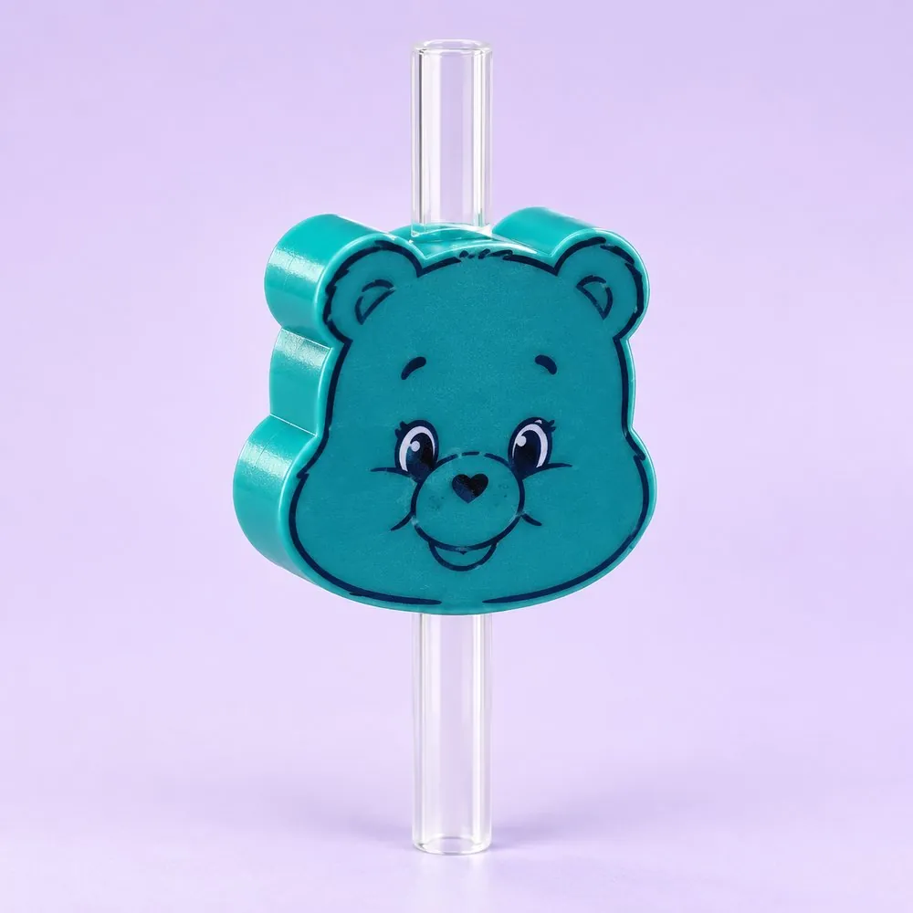 Teal Bear Topper on a clear straw, pale lavender backdrop — shaped like a teal cartoon bear face