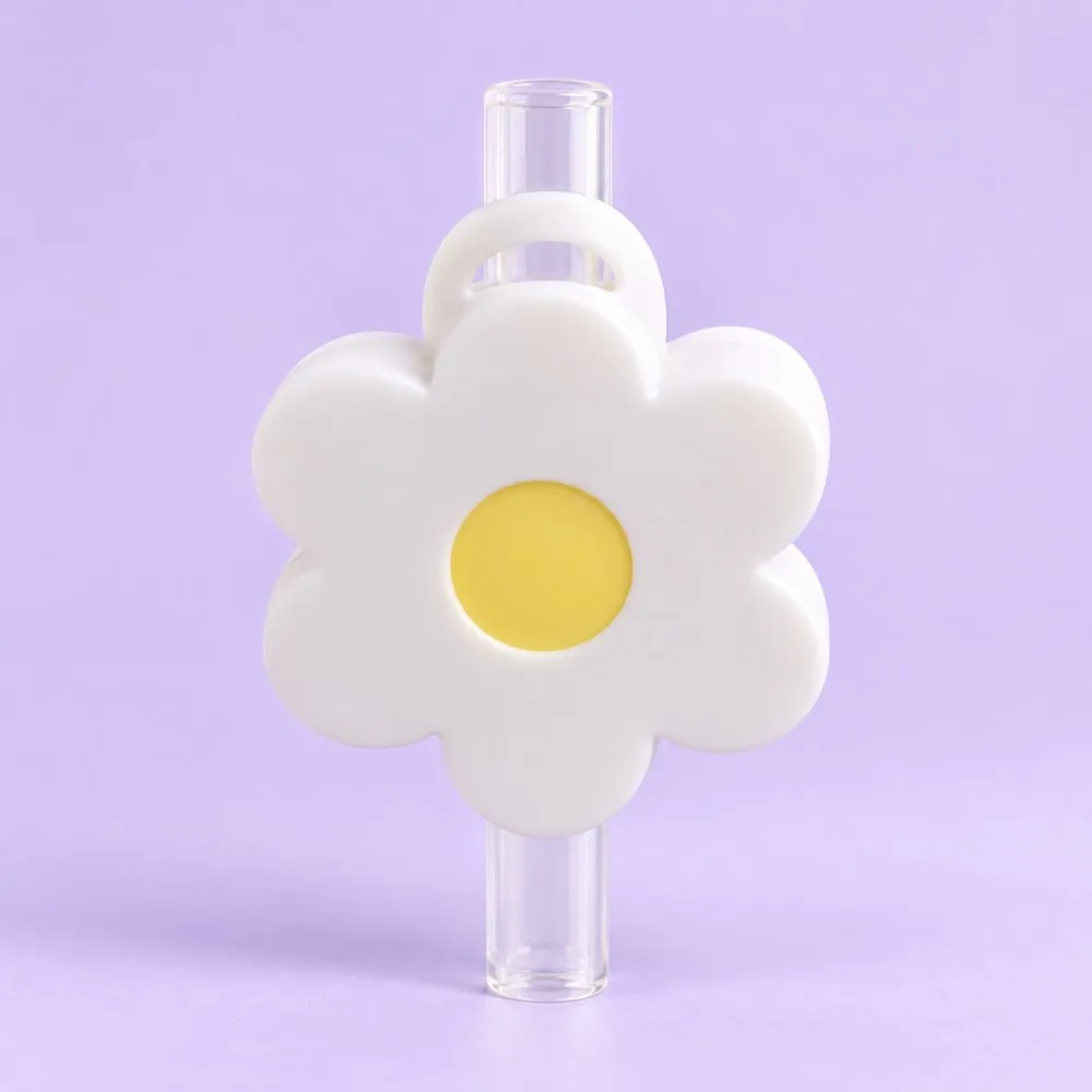 White Daisy Topper on a clear straw, pale lavender backdrop — shaped like a white daisy with a yellow center