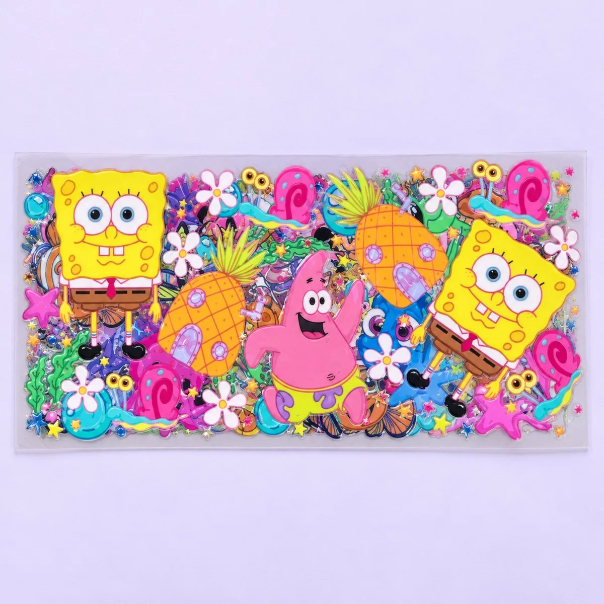 Pineapple Under the Sea cup wrap laid flat — a yellow sponge character, a pink starfish and pineapple houses with sea flowers
